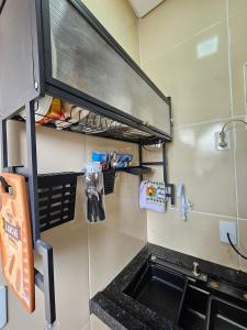 a kitchen with a sink and a counter top at Fully equipped apartment - Jardim Boa Vista in Caruaru