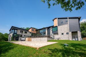an exterior view of a large building with a lawn at Sweet Dreams by Railey Vacations in McHenry