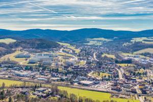 an aerial view of a city with mountains in the background at Apartment in Wutha-Farnroda 3178 in Wutha-Farnroda