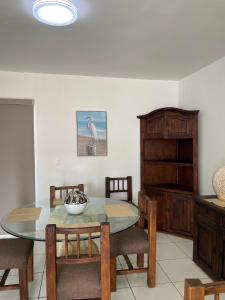 a dining room with a table and chairs at Casa Coralina in San Carlos