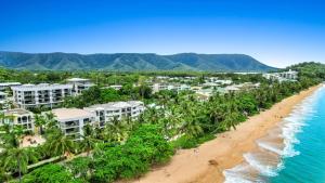 an aerial view of a resort and the beach at Trinity Beach Pacific in Trinity Beach