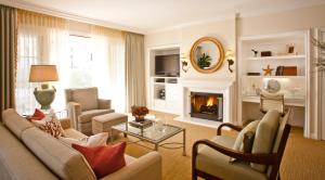 a living room with a couch and a fireplace at Four Seasons Residence Club Aviara in Carlsbad