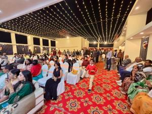 a large group of people sitting in a room at Hotel Diamond Crest, Patna in Patna