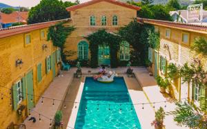 an aerial view of a swimming pool in a house at SATTAHIP Zentobu House in Ban Tao Than +20 photos