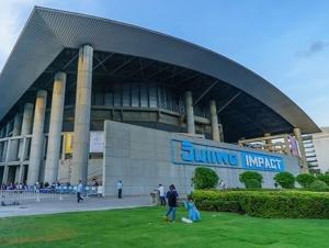 a large building with people standing outside of it at Hi Impact Muangthong T9 in Nonthaburi