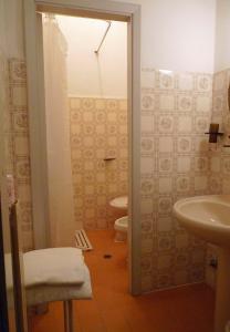 Koupelna v ubytování Hotel Giardinetto