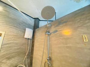 a shower in a room with a ceiling at Family view A4 -Kantiang paradise resort- in Ko Bu Bu