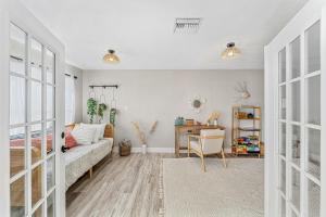 a bedroom with a bed and a desk at 332 Formosa Drive in Cocoa Beach