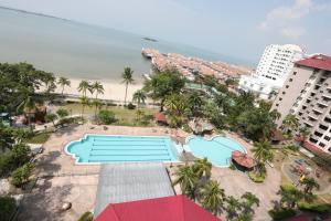 an overhead view of the pool and the beach at PortDickson Sakura 10Pax 3BR Glory Beach Resort Suite in Port Dickson