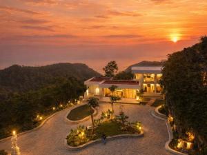 an aerial view of a house at night at Stone Valley Resort & Beach in Tepus