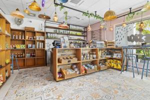 a grocery store with shelves of food at Delfins Beach Resort Bonaire, Tapestry Collection by Hilton in Kralendijk