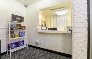 a room with a mirror and shelves with food at 대구 더스테이낭만 태전점 in Daegu