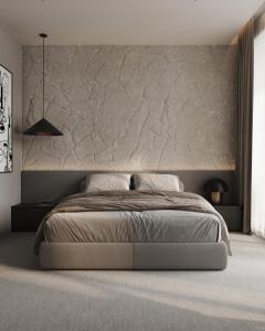 a bedroom with a bed and a stone wall at Villa White Lotus in Selca +17 photos