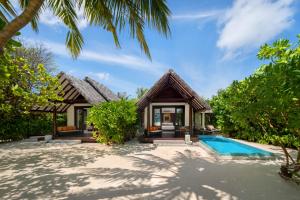 an image of a villa with a swimming pool at Heritance Aarah - Premium All Inclusive - 40 Minutes away from Male by Seaplane in Raa Atoll