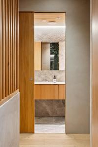 a bathroom with a sink and a mirror at Inai Haven in Ivalo