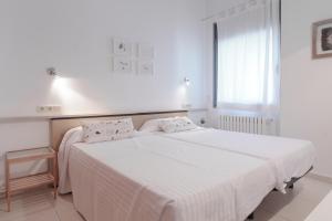 Ένα ή περισσότερα κρεβάτια σε δωμάτιο στο Outdoor Apartaments - Comfort