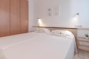Ένα ή περισσότερα κρεβάτια σε δωμάτιο στο Outdoor Apartaments - Comfort