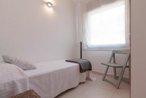 Ένα ή περισσότερα κρεβάτια σε δωμάτιο στο Outdoor Apartaments - Comfort