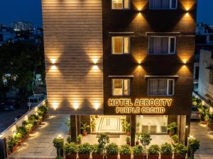 a hotel exterior with a hotelagency purple carpet at Hotel Aerocity Purple Orchid in New Delhi