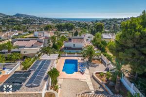 an aerial view of a house with a swimming pool at Villa Ananas by Abahana Villas in Moraira