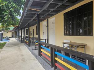 a row of tables on the side of a building at Island Sea One Resort in Panglao Island