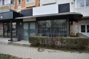 a store front of a building on a city street at Glow Sahara in Focşani +8 photos