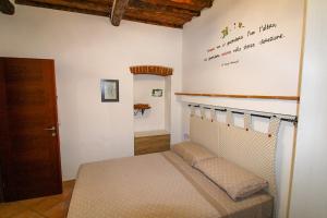a bedroom with a bed in a room at Casa Carlo in Rio Marina
