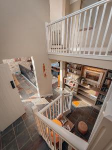 an overhead view of a staircase in a house at Smiley's Cottage in Doagh