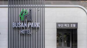 a bussan park hotel sign on the side of a building at 부산파크호텔 in Busan