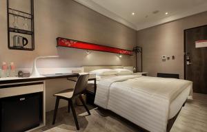 Letto o letti in una camera di City Place Hotel