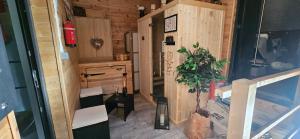 an interior view of a tiny house at Haut Doubs Plaisir SPA in Chamesol