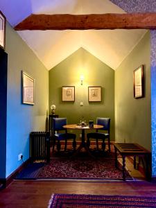 a dining room with a table and chairs at The Lady Maxwell Room at Buittle Castle in Dalbeattie