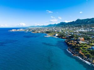 an aerial view of a city and the ocean at Villa Amazing by HolidayKeys in Kyrenia