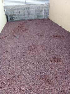 a room with a pile of dirt on the floor at Super boss in Saint-Benoît