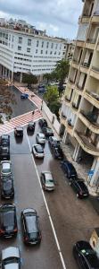 a group of cars parked in a parking lot in front of a building at Centre-ville rabat in Rabat
