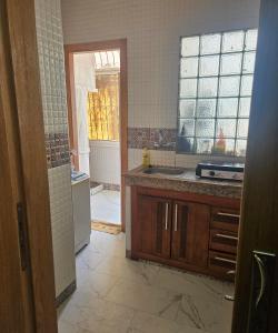 a kitchen with a sink and a counter top at Centre-ville rabat in Rabat