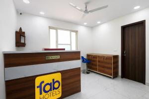 an office with a frito lay hotel reception desk at FabHotel Resto Relax in New Delhi