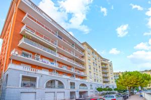 an apartment building with balconies on a street at Haut de Monaco - Vue panoramique mer et ville - FE in Beausoleil