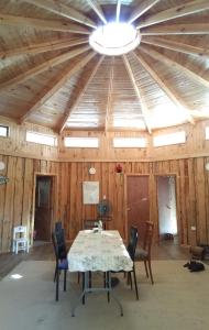 a large room with a table and chairs in it at Casa Hostal Familiar Espacio SaTaNaMa in El Torreón