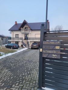 a sign in front of a house at Casa Nițică in Vaslui