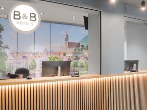 an office with a view of the bbc hotel at B&B Hotel Böblingen in Böblingen