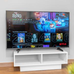 a television in a living room with a white tv stand at Modern 2 Bed Apartment - 2 Parking Spaces - Sleeps 3 - Netflix 1BS in Amblecote +19 photos