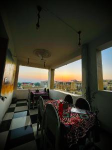 a dining room with a table and a view of a city at Hotel Heaven In Jaisalmer in Jaisalmer