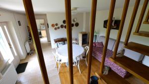 a room with a table and chairs in a room at Kuća za odmor Trnac in Tuhelj +29 photos
