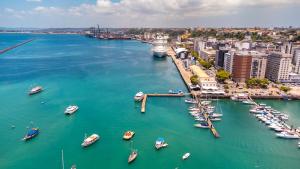 an aerial view of a harbor with boats in the water at Pousada Colonial Chile in Salvador