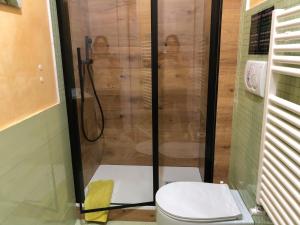 a bathroom with a shower with a toilet in it at Rizzi Marianna B&B in Monopoli +44 photos