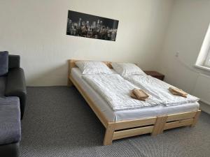 a bedroom with a bed in a room at Privát Nikodém in Veľký Slavkov