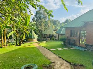 a view of the yard of a house at Oldadai Falls Retreat in Arusha