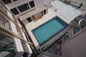 an overhead view of a swimming pool on a building at Hotel SagarPriya in Digha