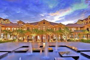 a large building with a fountain in front of it at Chic Studio near Ocean Park in Cebu City